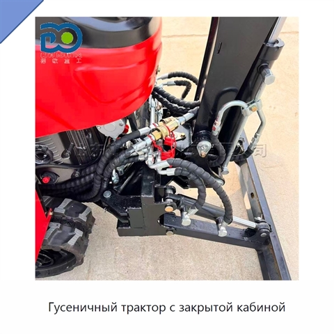 Гусеничный трактор с закрытой кабиной